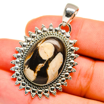 Sterling silver oval jasper pendant with ornate beaded halo and loop bail