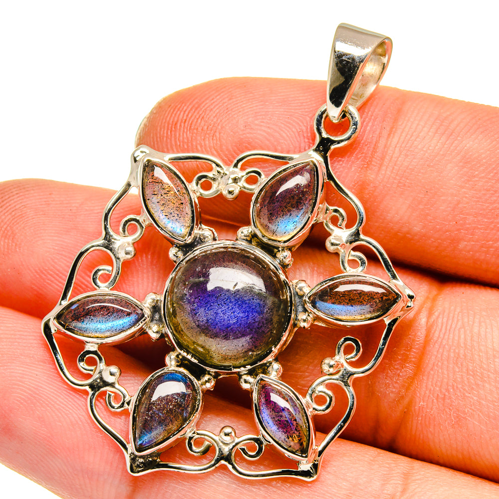Sterling silver pendant detail with blue-purple labradorite stones and bail loop