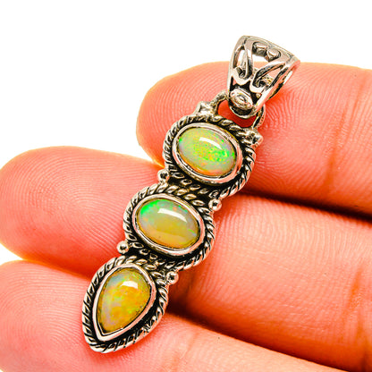 Sterling silver opal pendant with three oval Ethiopian opals in beaded settings