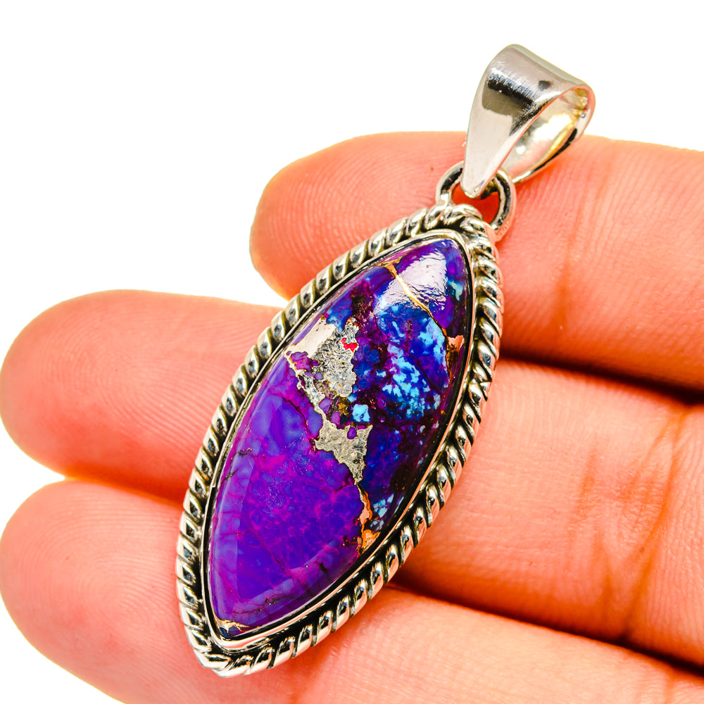 Sterling silver teardrop pendant with purple-blue gemstone and bail loop