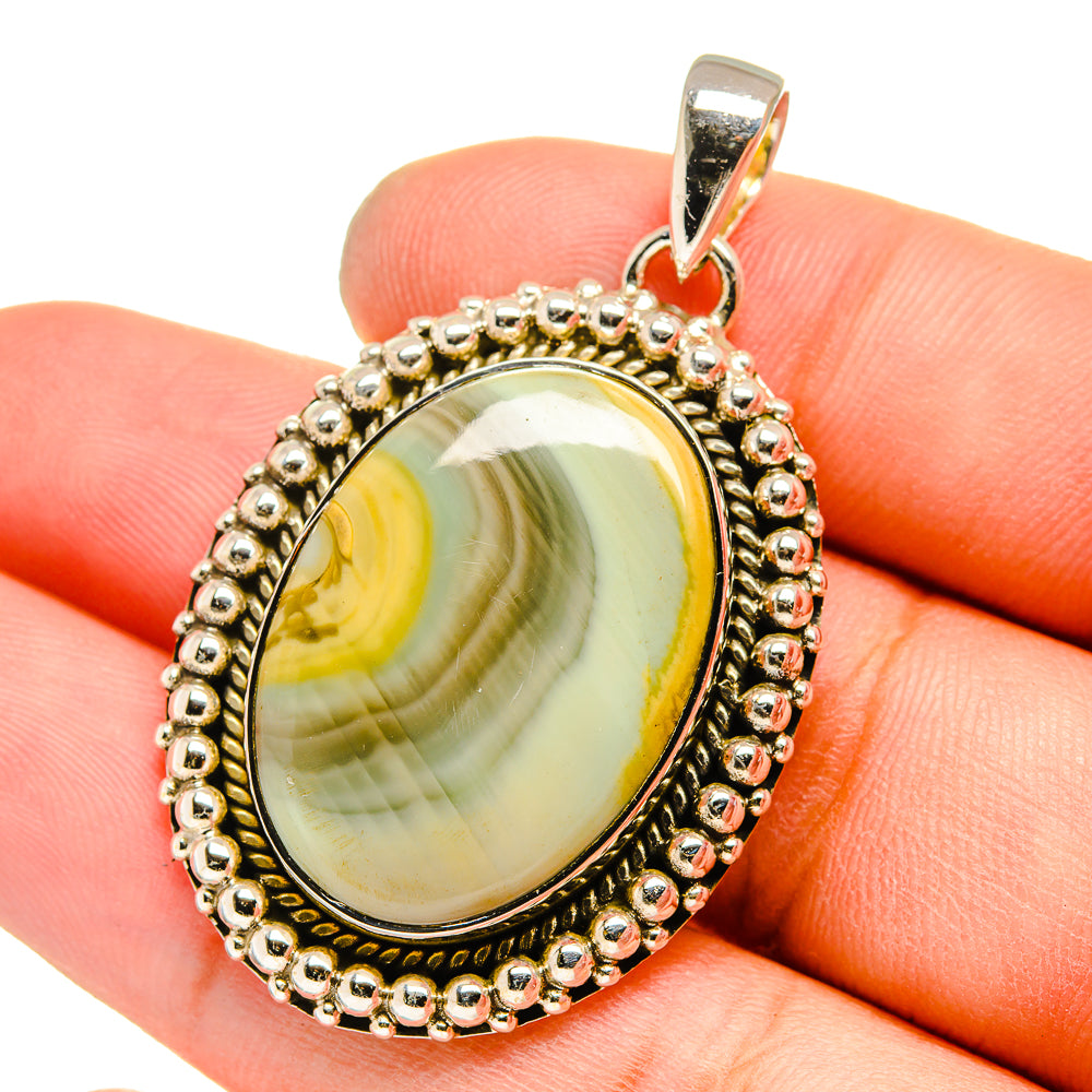 Oval jasper pendant in yellow-green with beaded silver frame and bail, 925 sterling