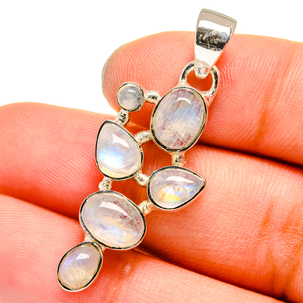 Sterling silver rainbow moonstone pendant with five oval cabochons on a bail
