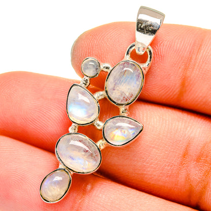 Sterling silver rainbow moonstone pendant with five oval cabochons on a bail