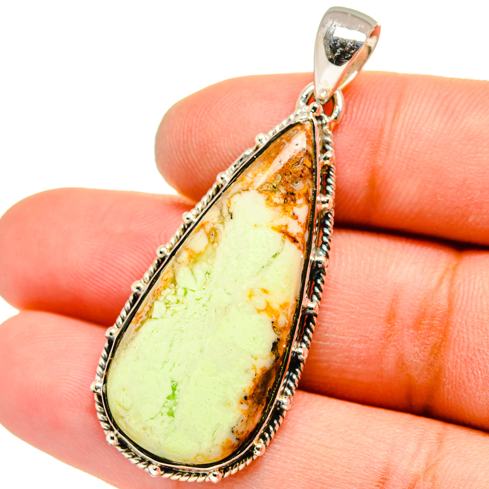 Sterling silver teardrop pendant with lemon-green chrysoprase cabochon, detailed bezel