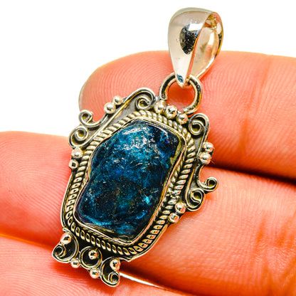 Close-up rough blue apatite pendant, ornate 925 sterling silver setting