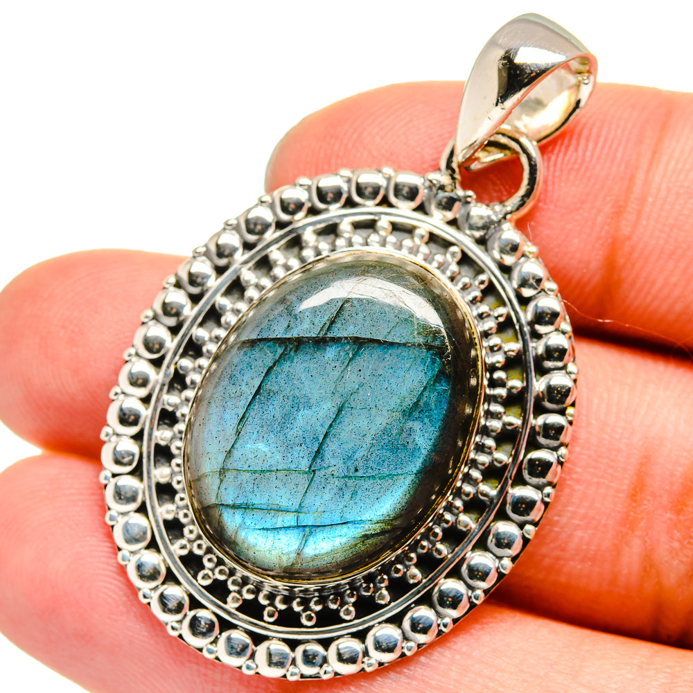 Labradorite pendant in sterling silver with oval blue flash stone