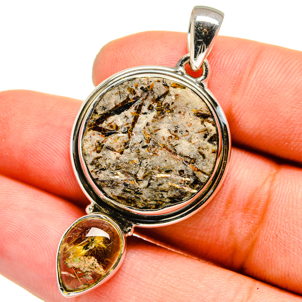Round rough astrophyllite pendant with silver bezel and small citrine teardrop charm