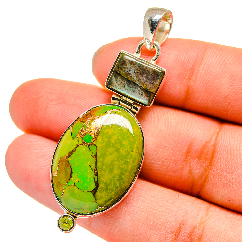 Green oval gemstone pendant with square top frame and small round green bead, sterling silver