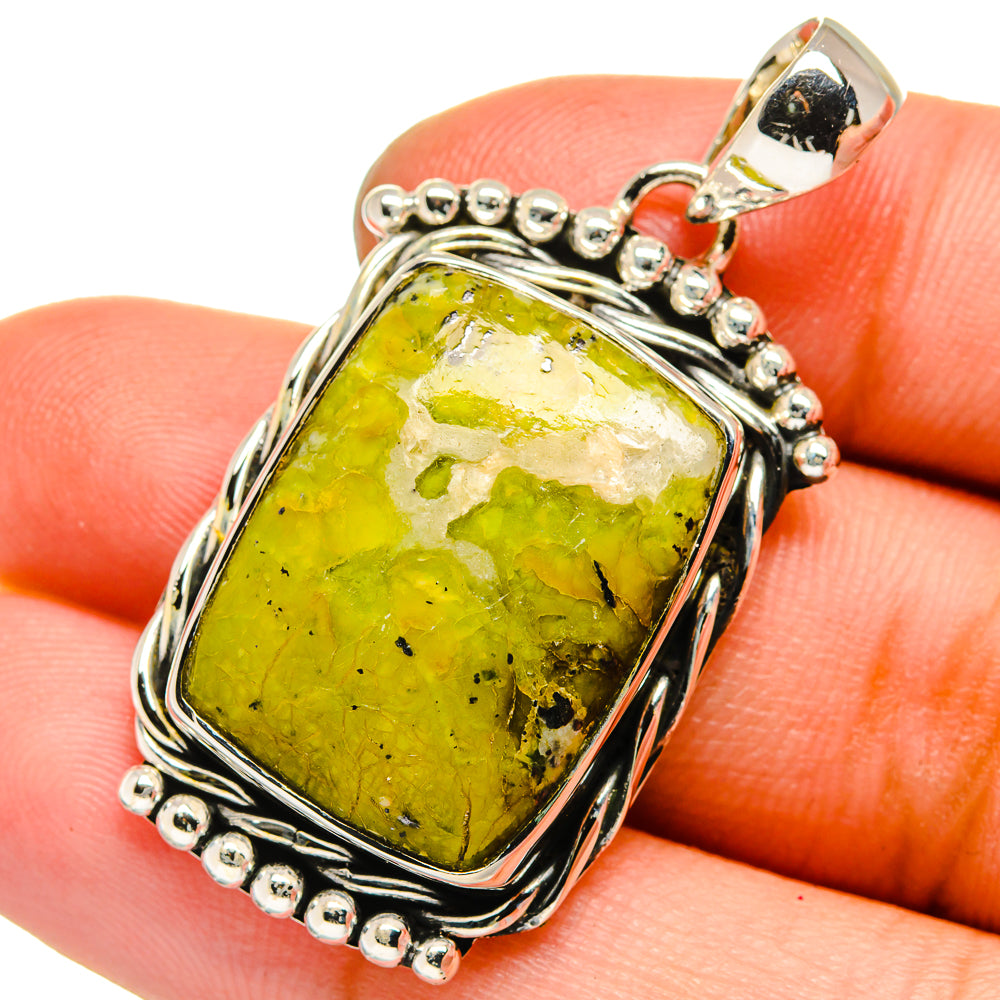 Green opal sterling silver pendant close-up on rectangular cabochon with beaded trim