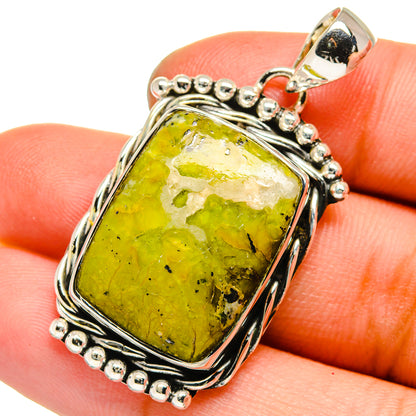 Green opal sterling silver pendant close-up on rectangular cabochon with beaded trim