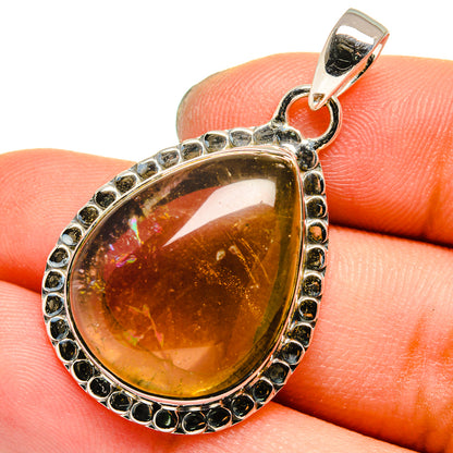 Teardrop citrine pendant in 925 sterling silver with textured bezel border