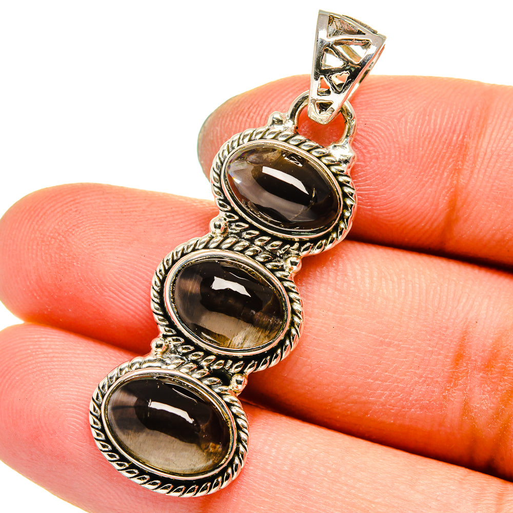 925 sterling silver 3-stone smoky quartz pendant with three oval dark cabochons
