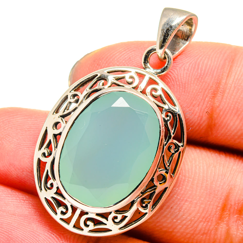 Oval aqua chalcedony pendant with filigree oval frame and split bail, 925 silver
