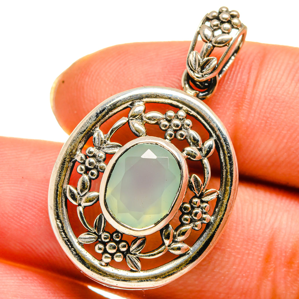 Aqua chalcedony pendant with oval mint gemstone in silver floral halo, bail top