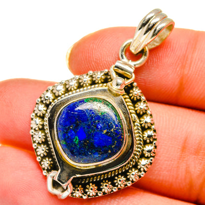 Sterling silver poison-style pendant with round blue gemstone and ornate beaded frame