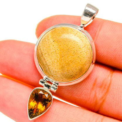 Sterling silver pendant with round yellow speckled jasper and teardrop citrine charm