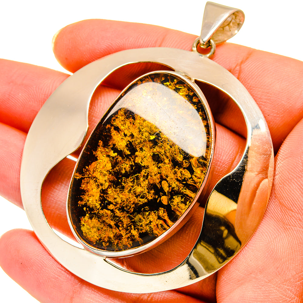 925 sterling silver Baltic amber teardrop pendant with oval halo frame