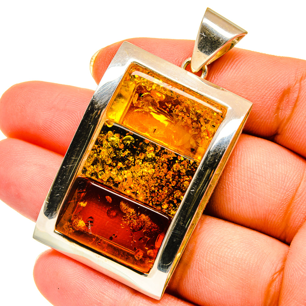 Amber pendant with rectangular Baltic amber stone in 925 silver frame, gold-toned bail