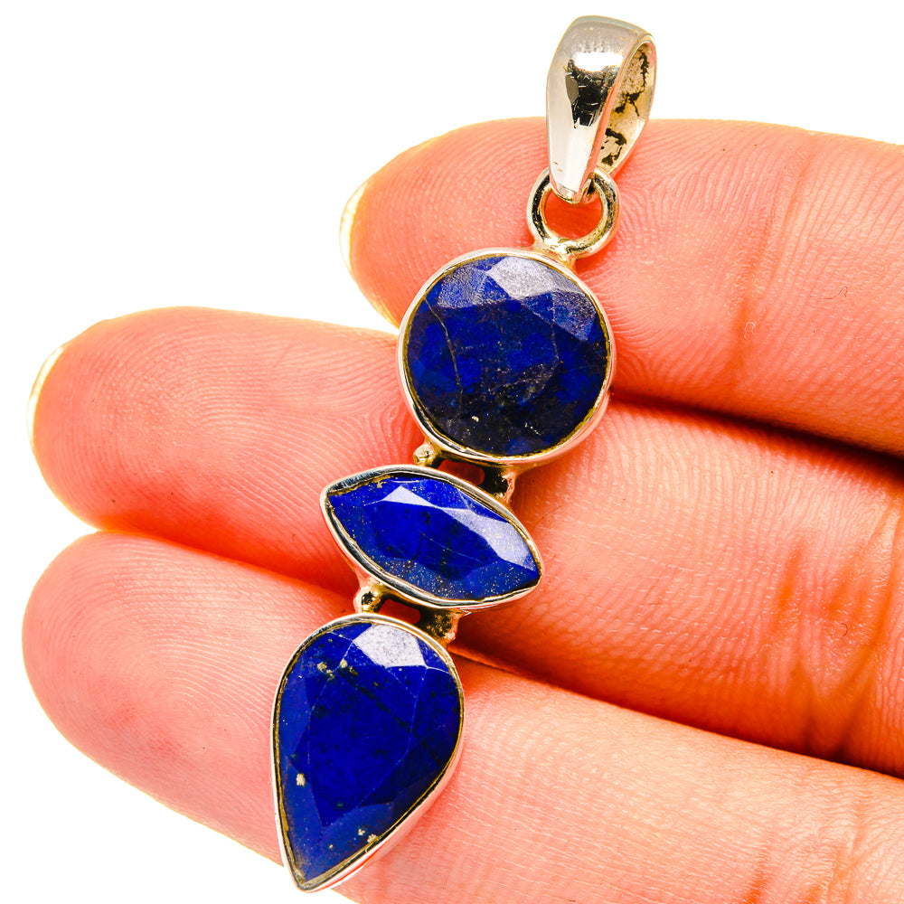 Lapis lazuli pendant with round and marquise blue stones in gold-tone links