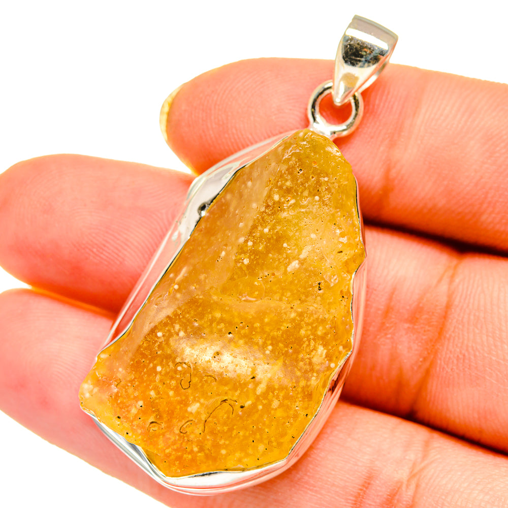Teardrop Libyan Desert Glass pendant in 925 sterling silver bezel, honey yellow glass