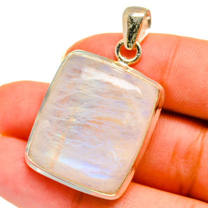 Square opalescent moonstone pendant with silver-toned bezel and gold-toned bail