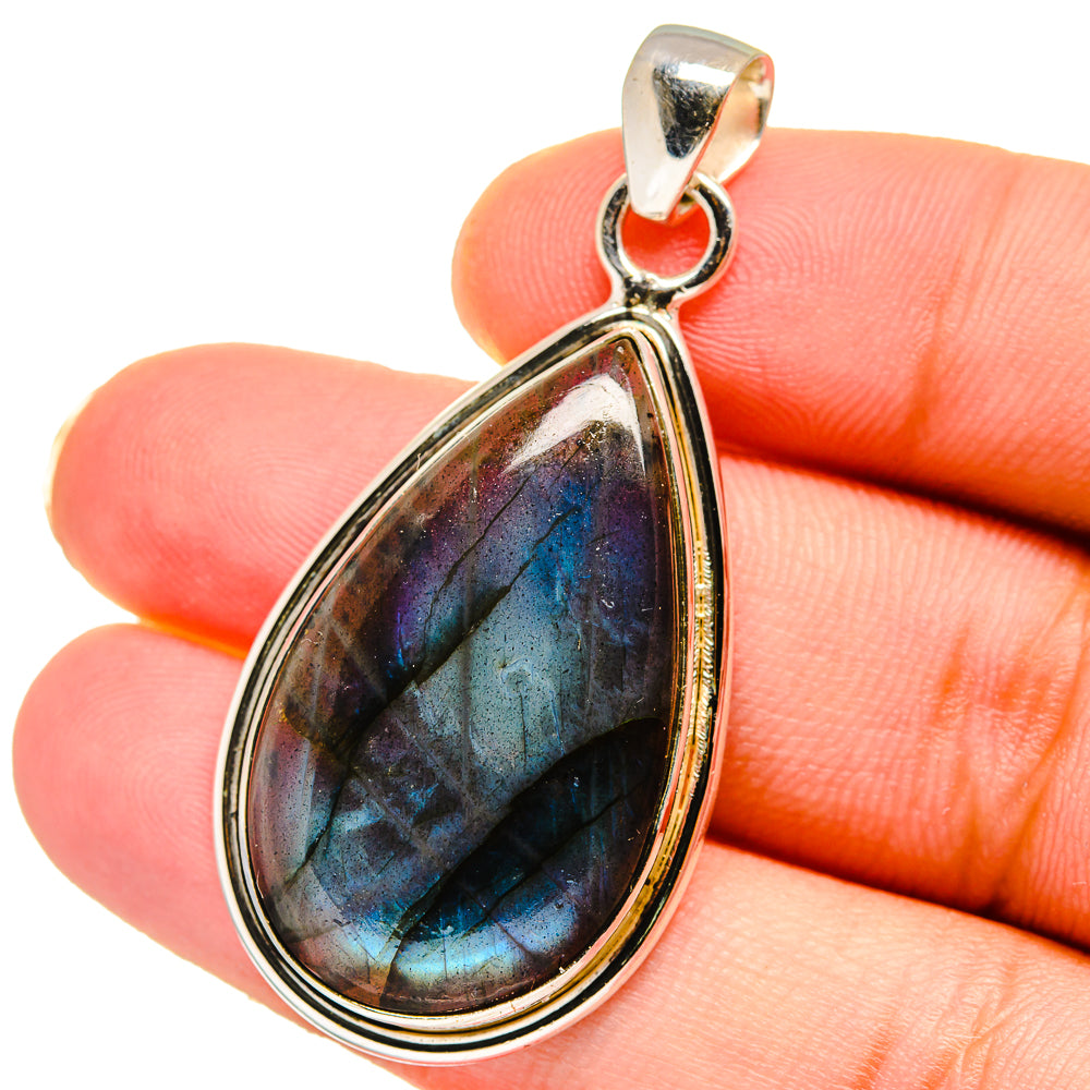 Labradorite sterling silver teardrop pendant with dark blue iridescent stone