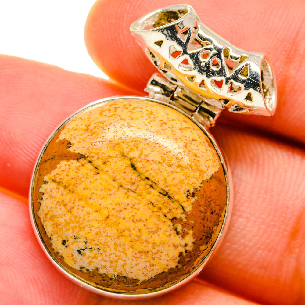 Round picture jasper cabochon pendant with sterling silver bezel and patterned bail
