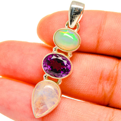 Sterling silver pendant with three oval stones: green opal, purple, and pale pink