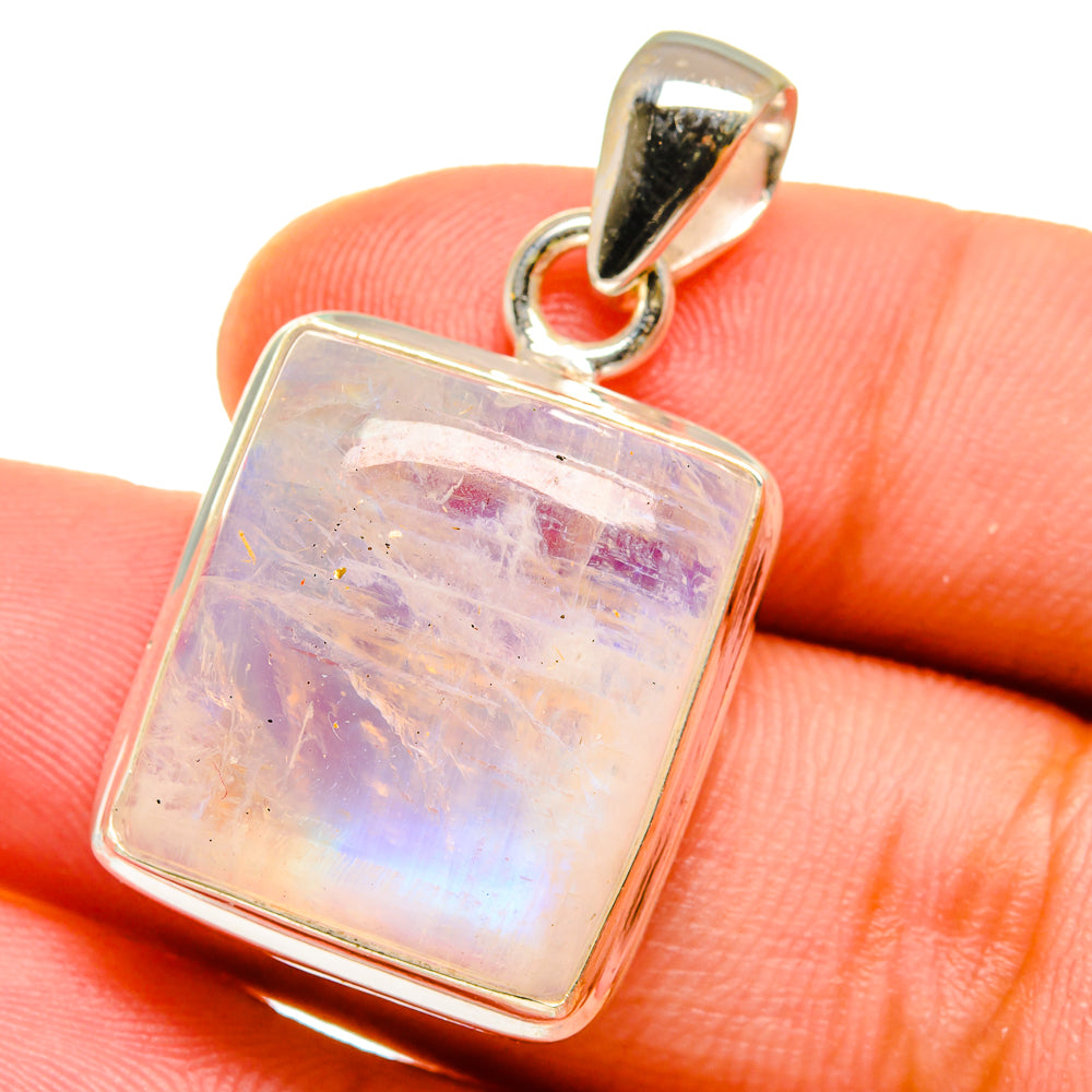 Sterling silver moonstone pendant with rectangular rainbow gemstone, close-up on bail