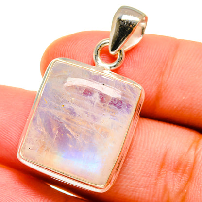 Sterling silver moonstone pendant with rectangular rainbow gemstone, close-up on bail
