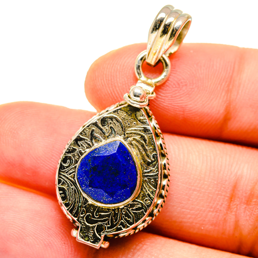 Poison lapis lazuli sterling silver pendant with teardrop bezel, blue cabochon and bail