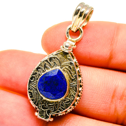 Poison lapis lazuli sterling silver pendant with teardrop bezel, blue cabochon and bail
