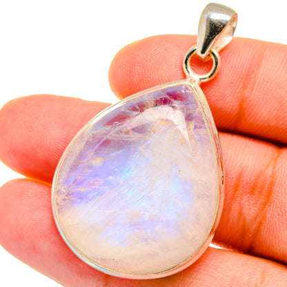Opalescent moonstone teardrop pendant in sterling silver bezel with small bail