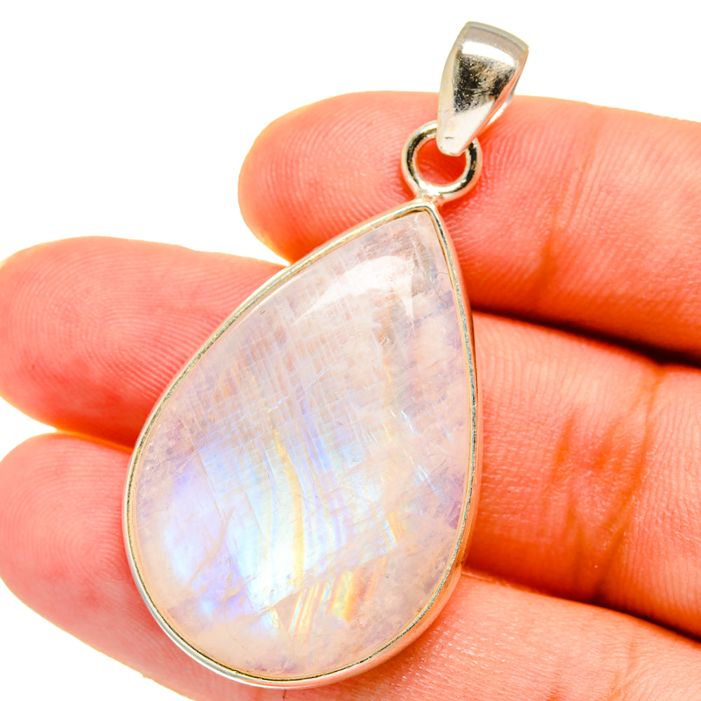Opalescent teardrop moonstone pendant in 925 sterling silver with bail loop.