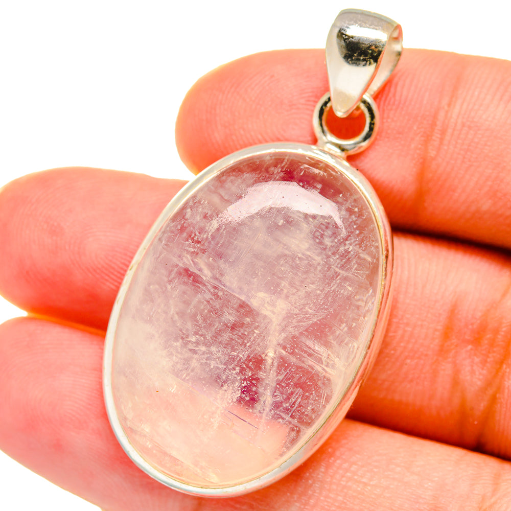 Oval moonstone pendant with sterling silver bezel and bail, pink translucent cabochon