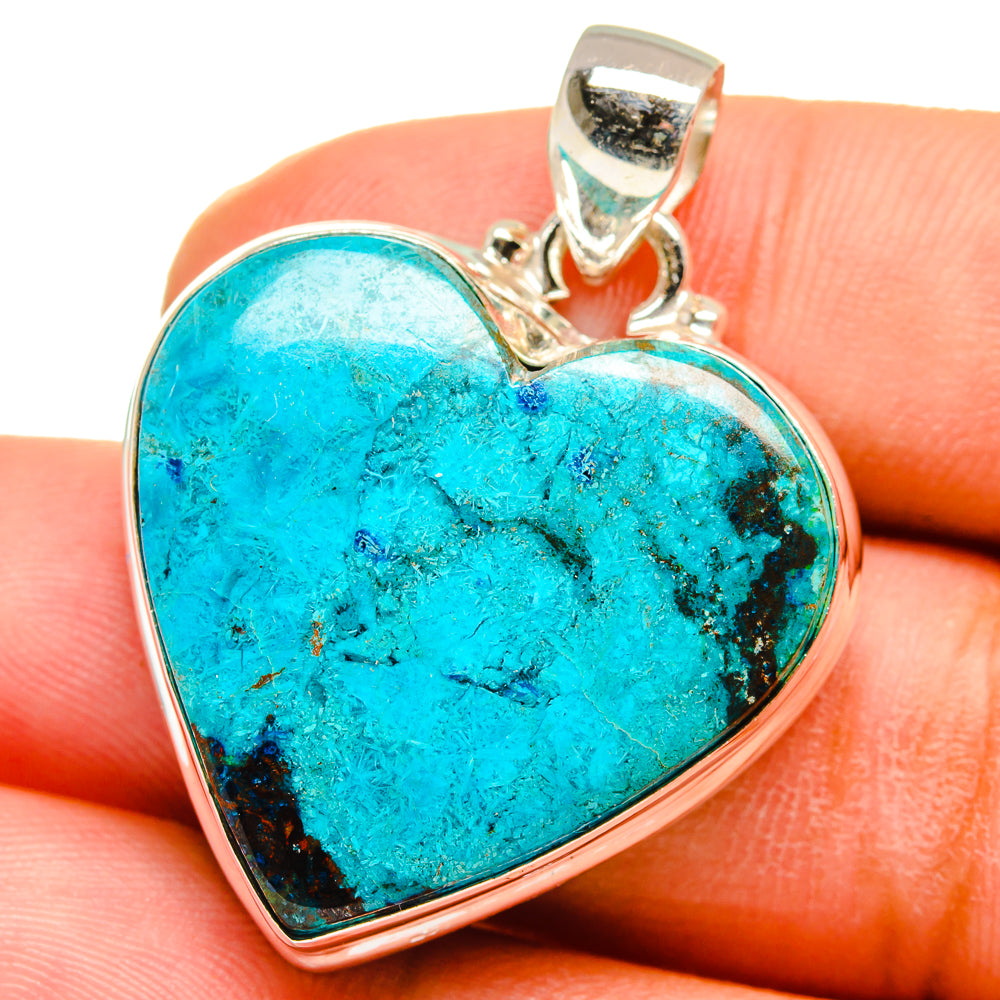 Turquoise heart gemstone pendant with silver frame and loop bail