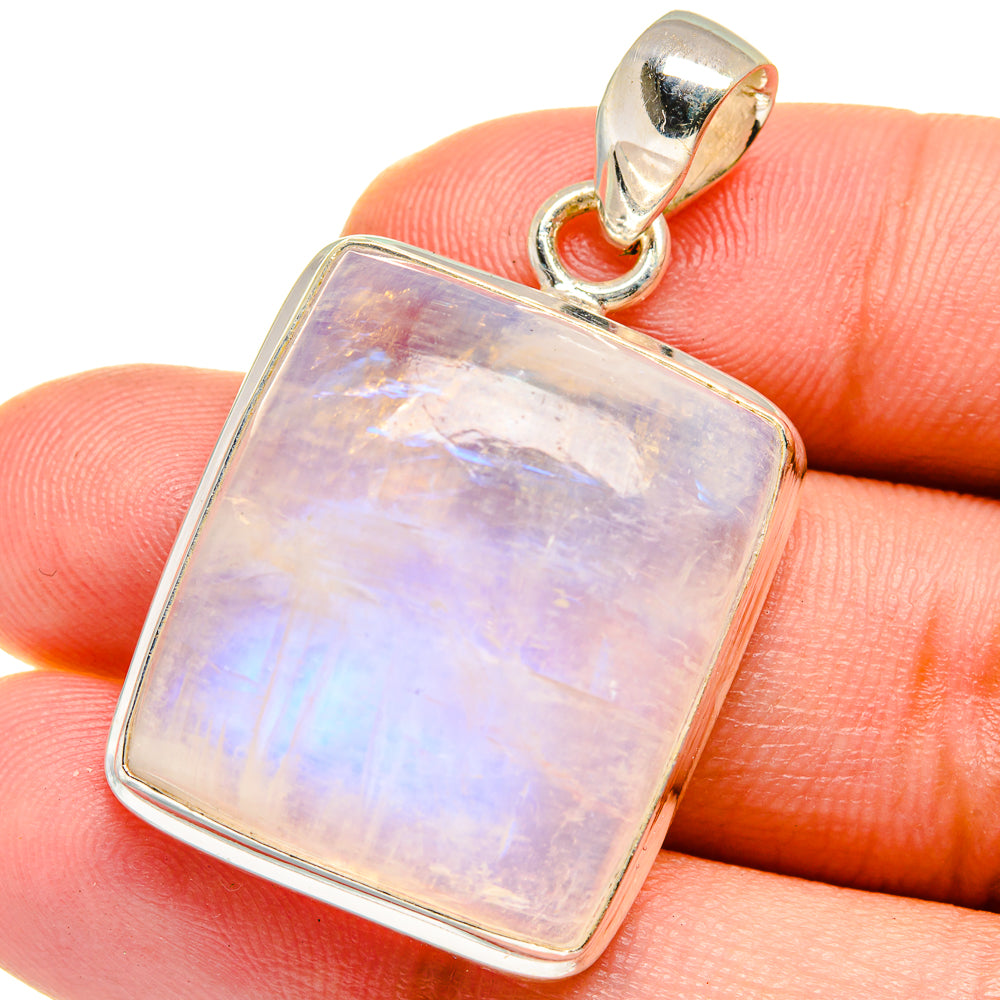 Rainbow moonstone pendant with sterling silver square bezel and side bail, lavender glow.