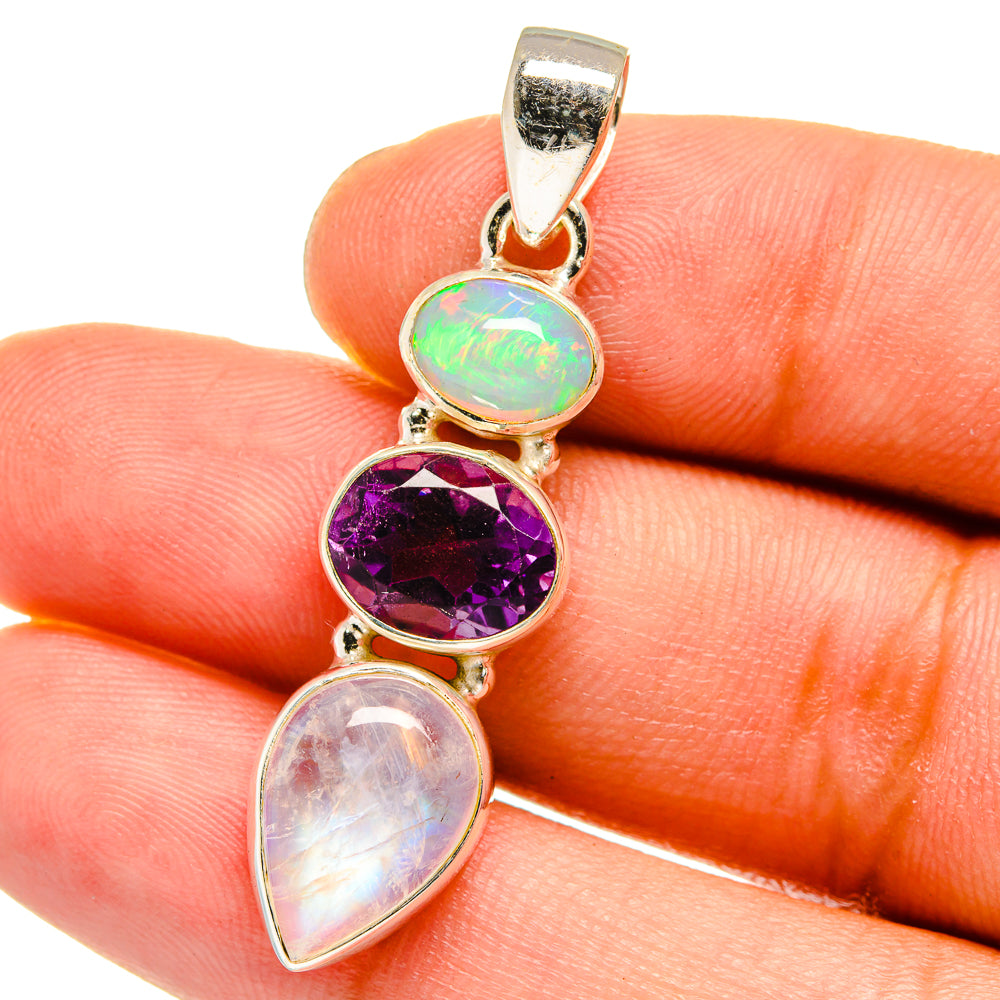 Sterling silver pendant with purple amethyst, opal, and white oval stone drop