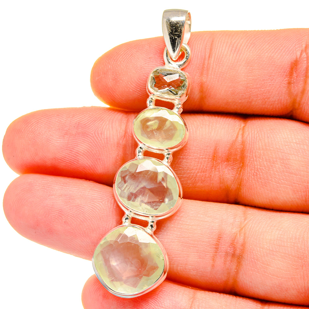 Prehnite pendant in 925 sterling silver with four faceted oval light-green stones