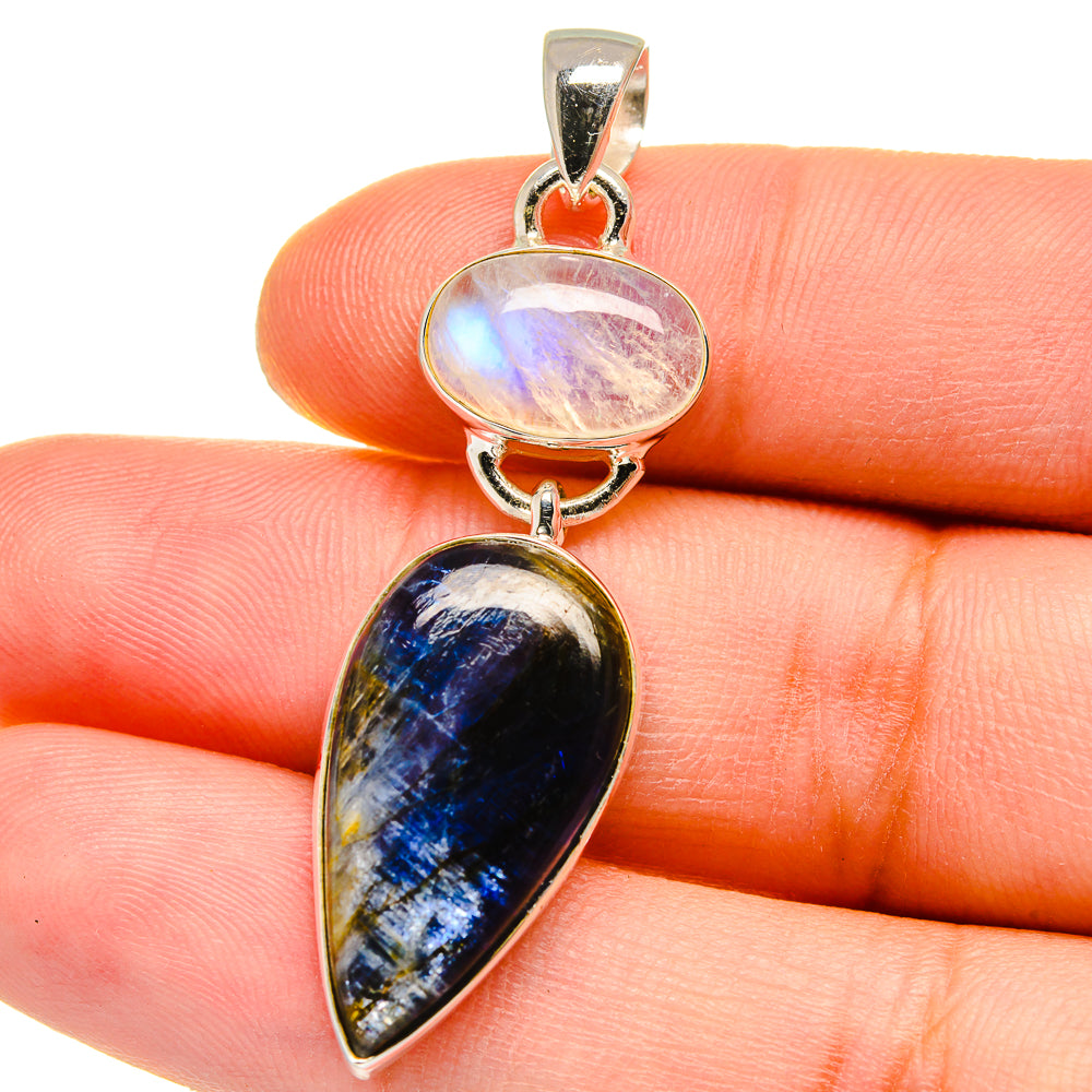 Oval rainbow moonstone and teardrop kyanite pendant in polished 925 sterling silver