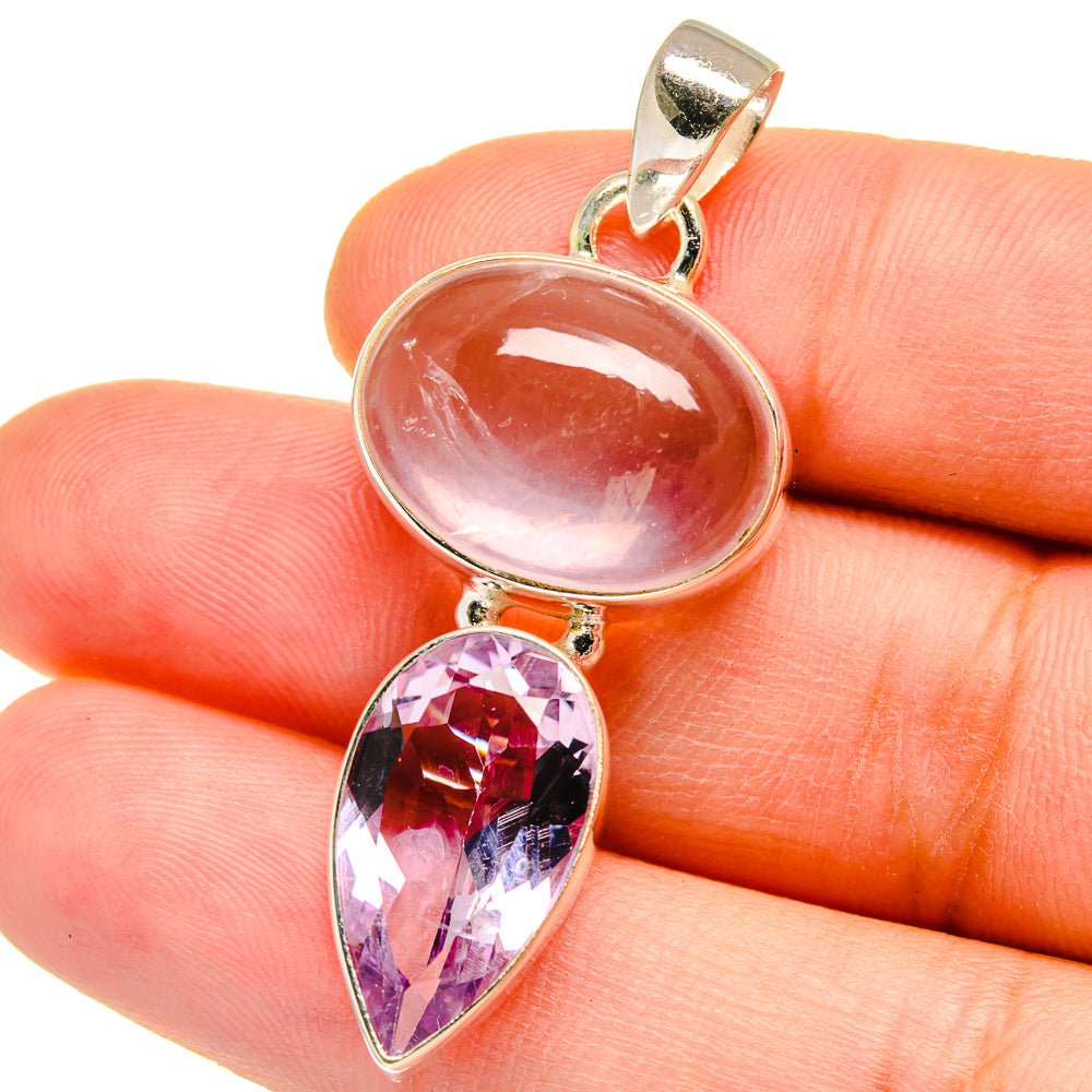 Close-up of rose quartz oval and amethyst teardrop pendant in silver bezel