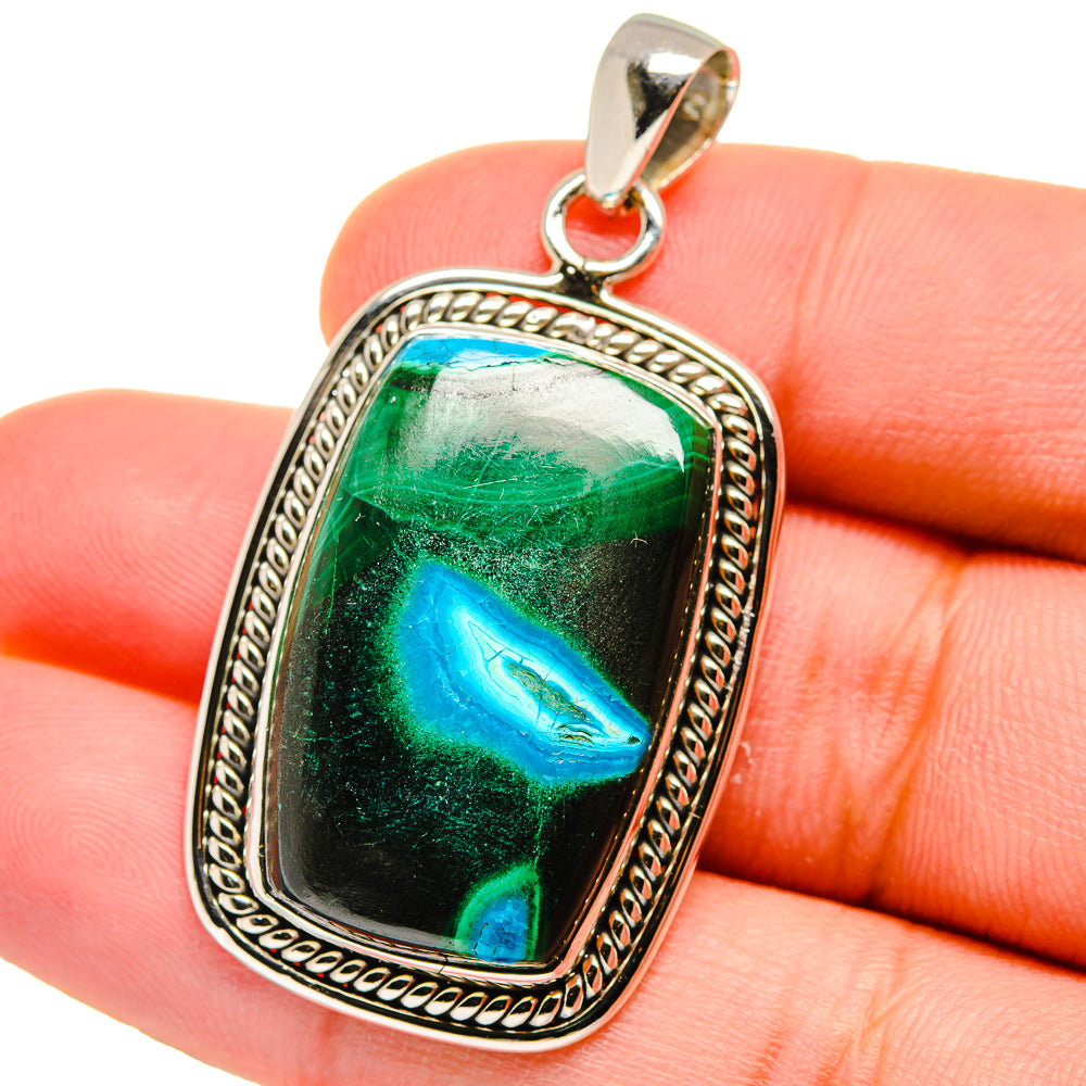 Sterling silver pendant with green-and-blue rectangular stone and loop bail