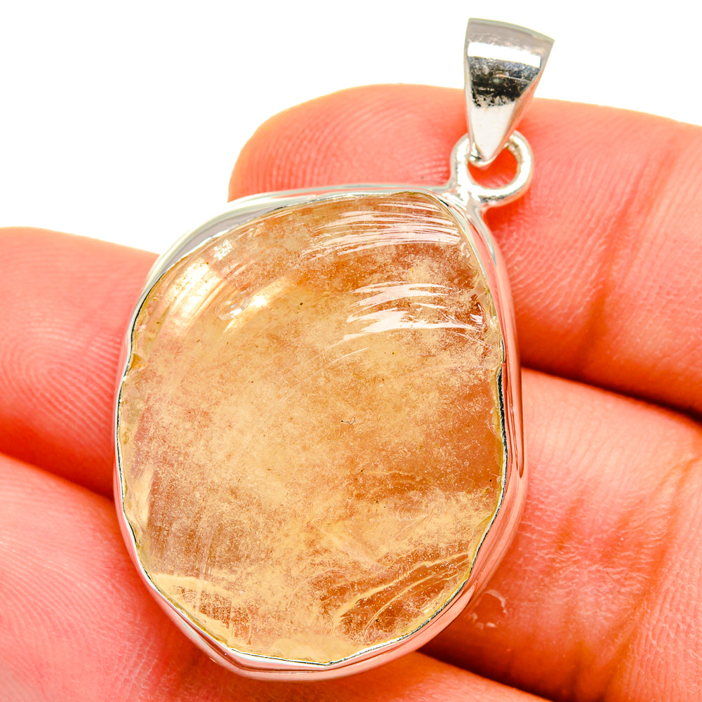 Oval pendant with warm amber-brown Libyan Desert Glass, 925 silver bail and bezel