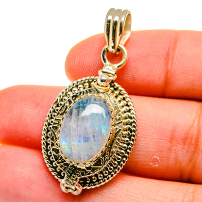 Rainbow moonstone pendant in 925 sterling silver, ornate oval frame with bail
