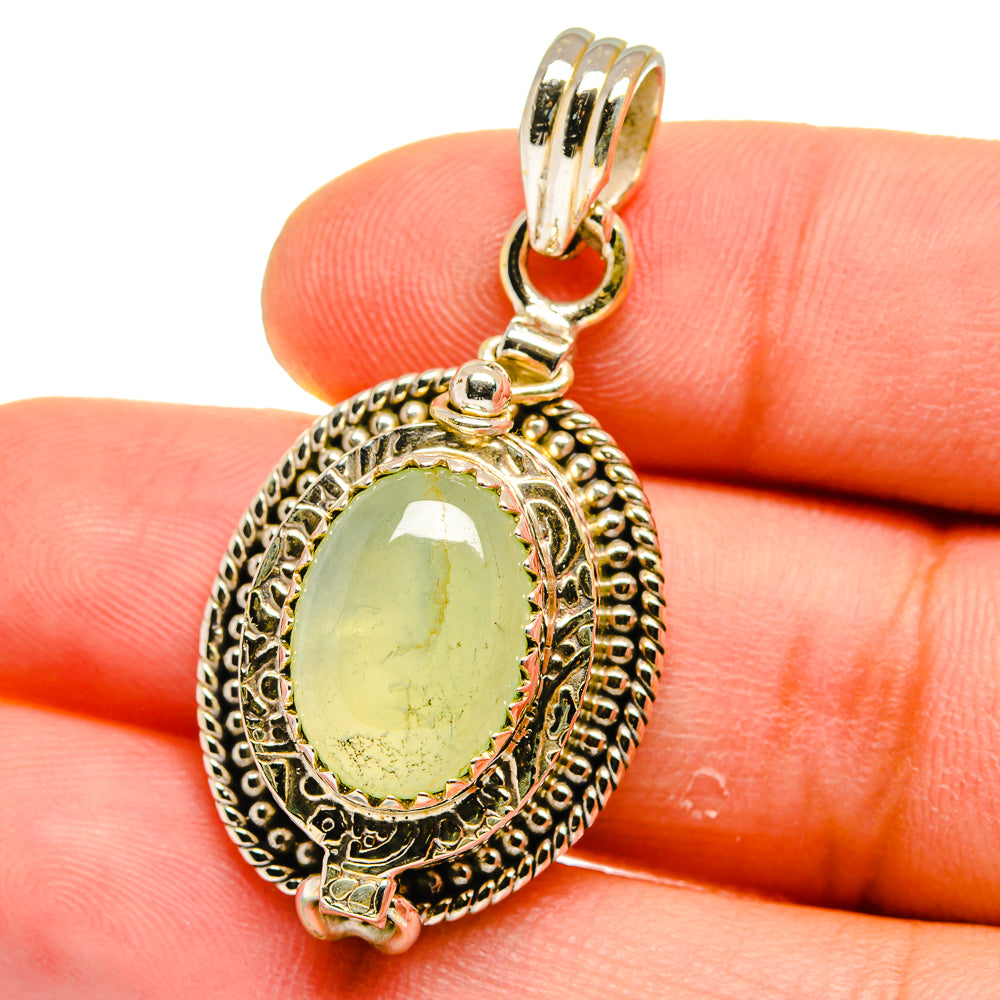 Sterling silver prehnite oval pendant close-up with green stone and beaded border