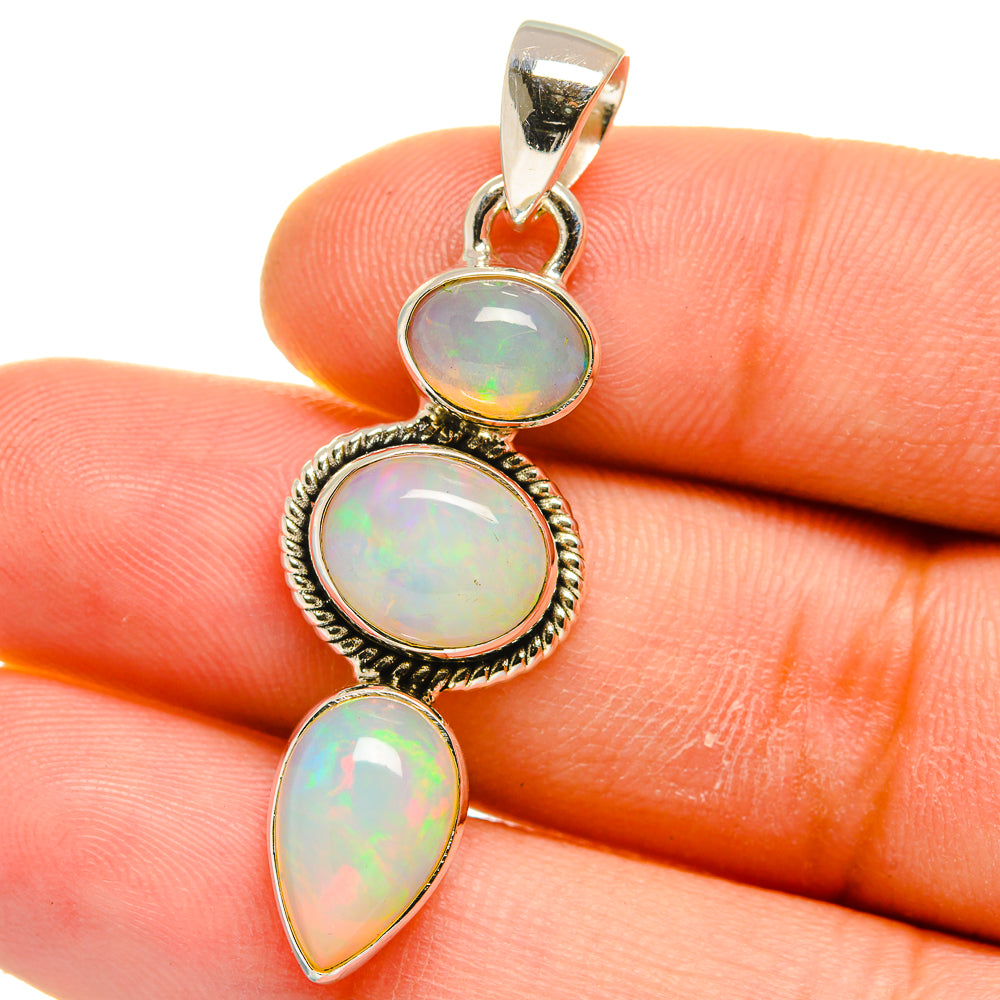 Iridescent opal pendant with three linked drops in 925 sterling silver setting