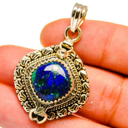 925 sterling silver pendant with oval blue gemstone and filigree frame