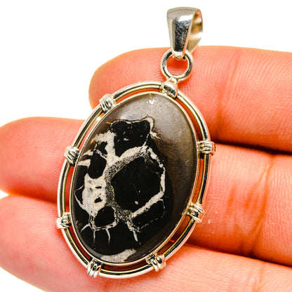 Oval black septarian geode pendant in 925 sterling silver bezel with loop bail