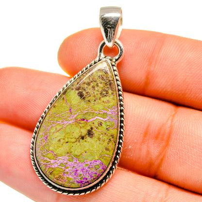 Teardrop sterling silver pendant with yellow, purple, and gold stone cabochon