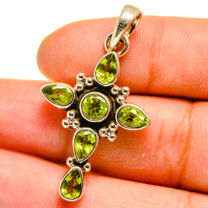 Sterling silver peridot pendant cross with green oval and round gemstones